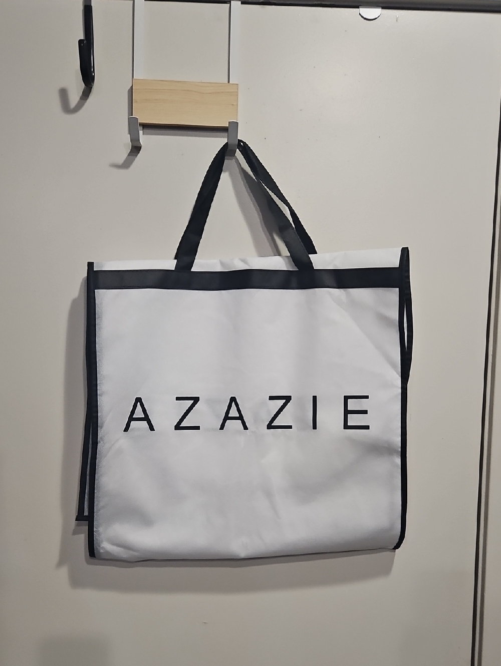 Azazie White and Black Logo Garment Bag